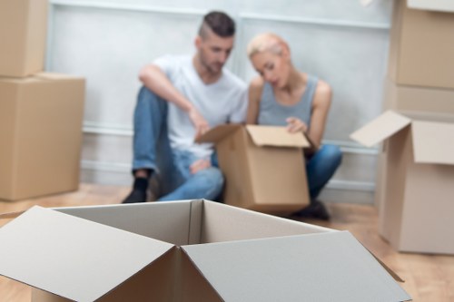 Professional movers preparing packing materials in Croydon